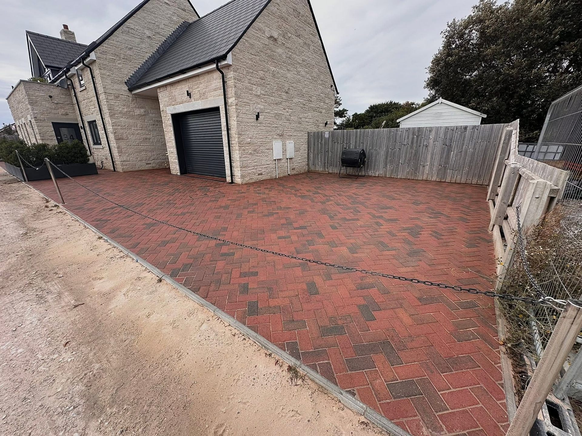 Block paving driveway restored to original colour by Dorset Exterior Cleaning